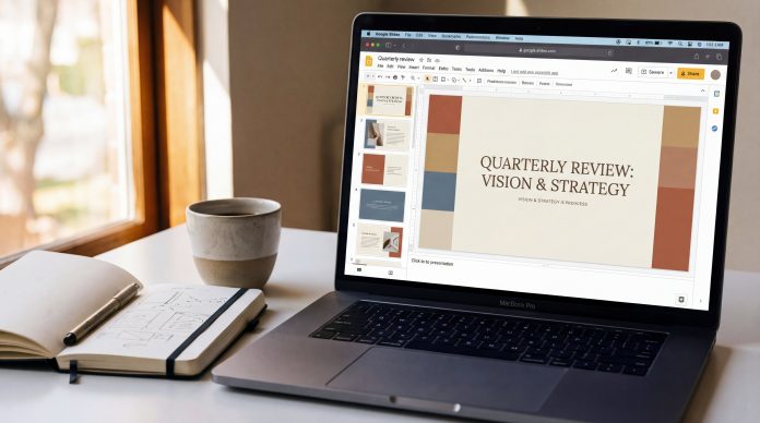 Laptop screen showing a beautifully designed Google Slides presentation with clean layouts and modern typography